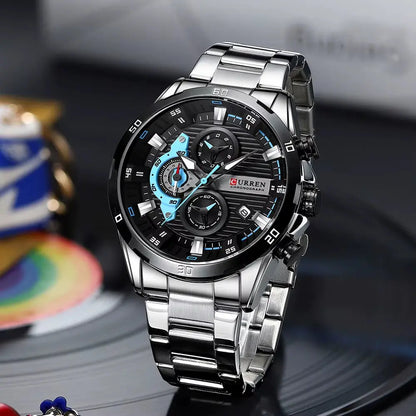 Montre homme chic en acier inoxydable, mouvement quartz, cadran phosphorescent et chronographe.